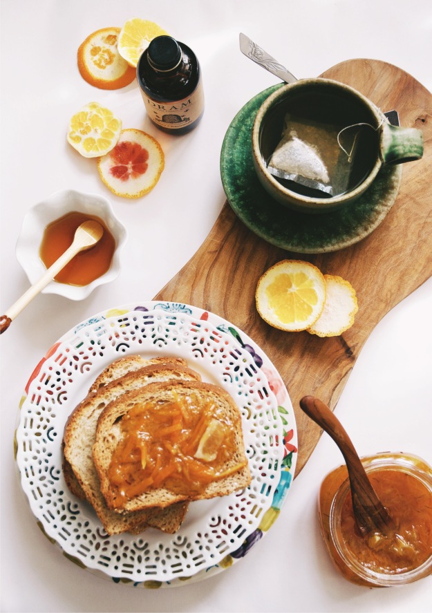 plate of toast with marmalade and tea